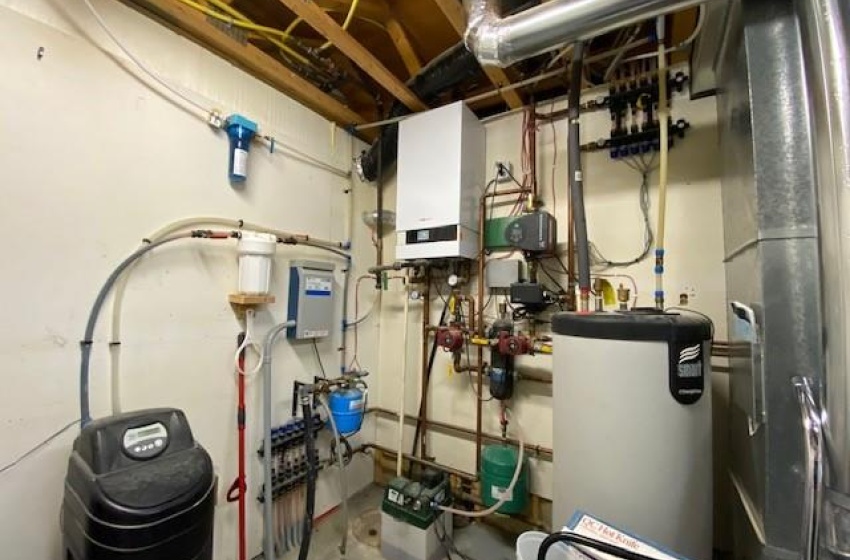 Mechanical room showing softener; hot water on demand; pressure pump