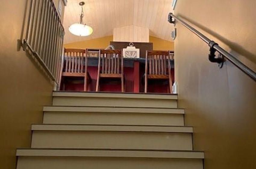 Stairs to main level from the walkout basement area