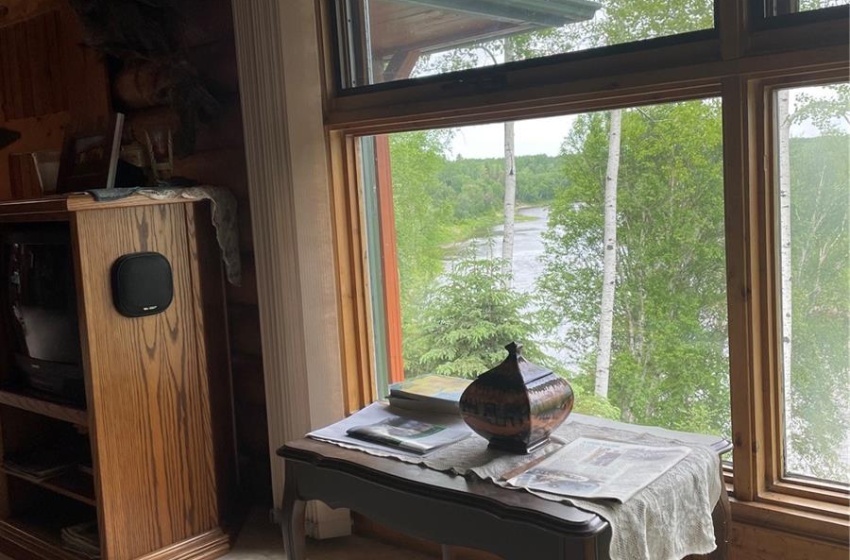 Living room looks over the ripple of the river