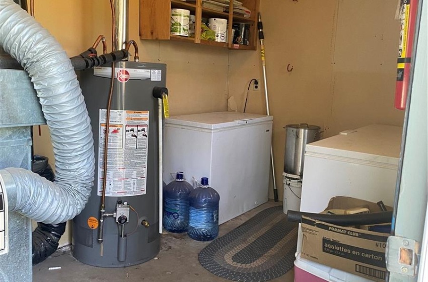 furnace and water heater room in back of garage