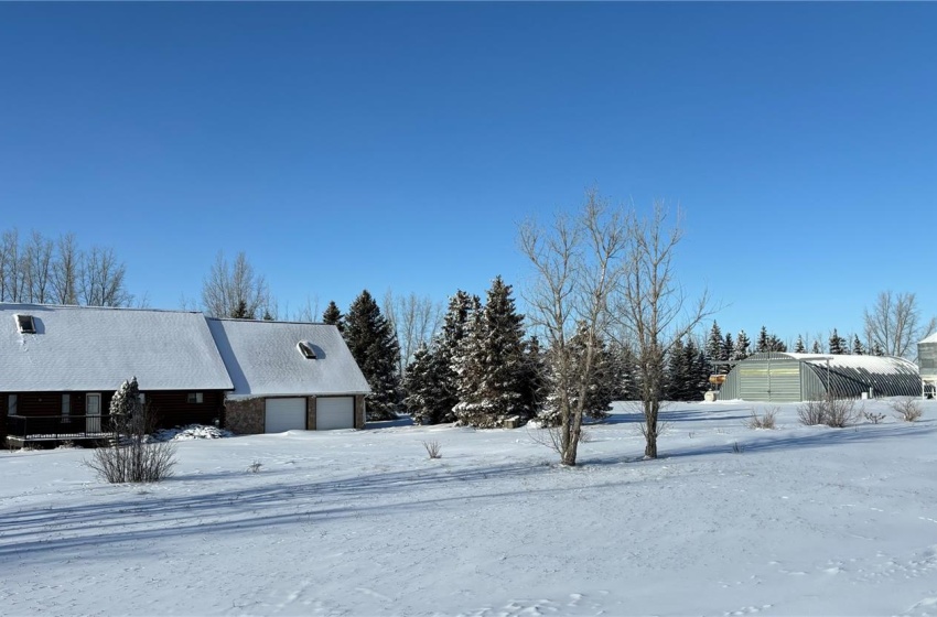 View of snow covered property