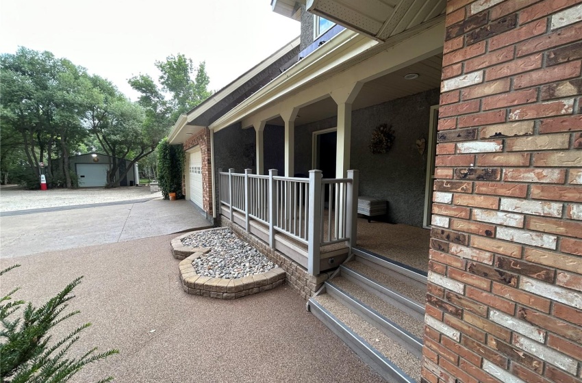 Front Entryway. Part of the many high-end ground finishes (IE: NatureStone, Concrete, paving, Stamped concrete)