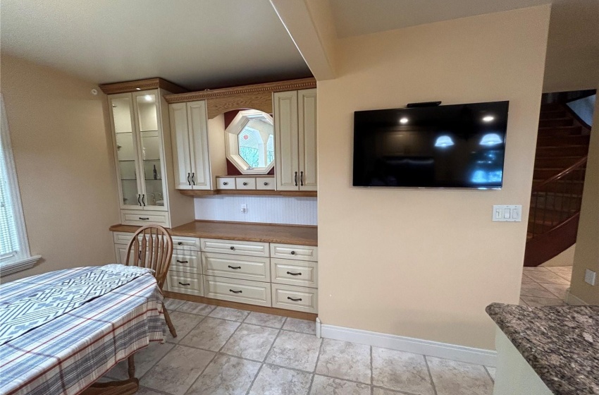 Adjoining Dining Area with custom cabinetry