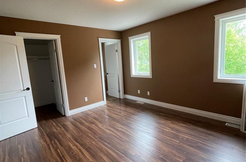 Main bedroom has walk in closet 3 pc bath and 2 large window to look at back yard and Red Deer River