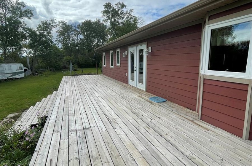 Large deck out dining faces the river and back yard