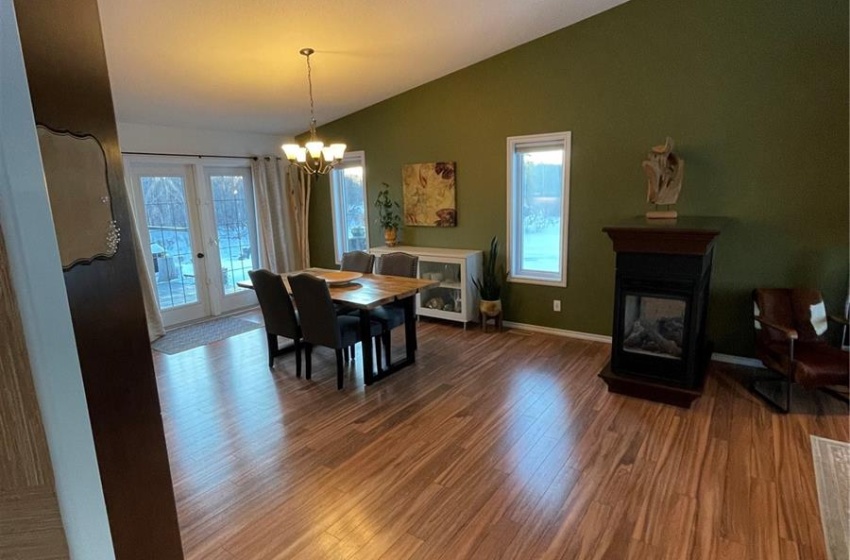 Vaulted ceilings french doors to deck looking on to Etomami River