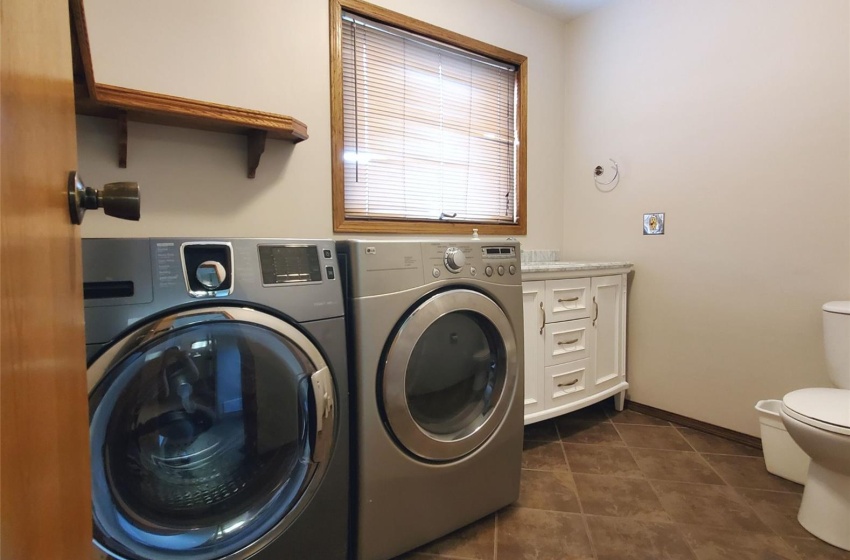 Laundry + 2pc bathroom between between floor levels