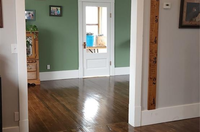 Unfurnished room with dark hardwood / wood-style floors