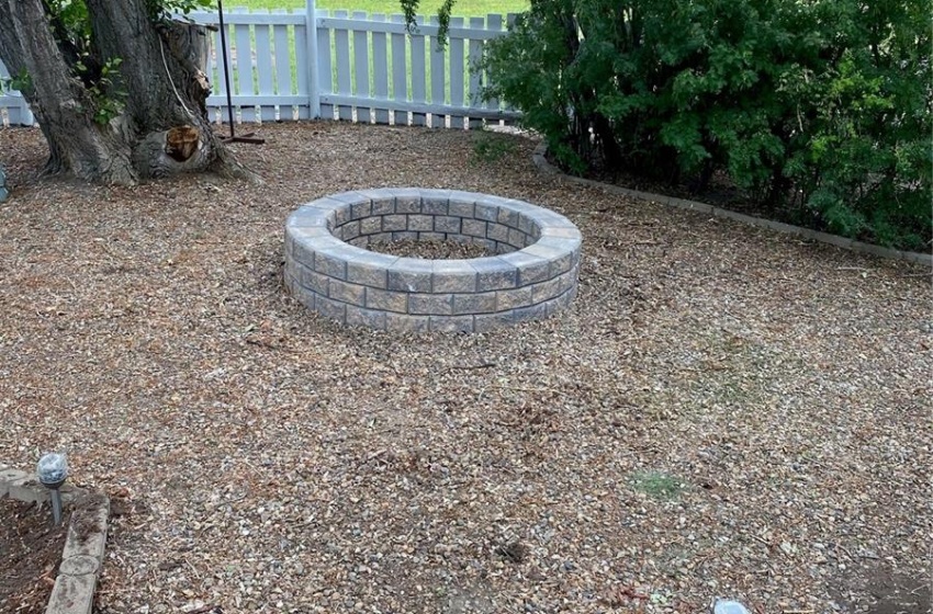 View of yard featuring a fire pit