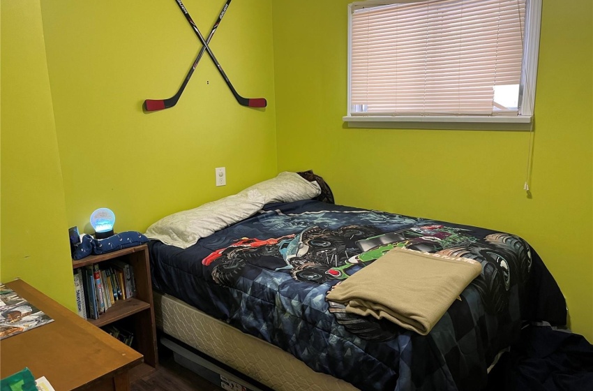 Bedroom featuring dark hardwood / wood-style flooring