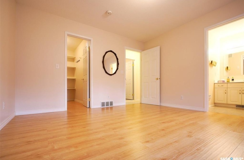 Unfurnished room with light wood-type flooring