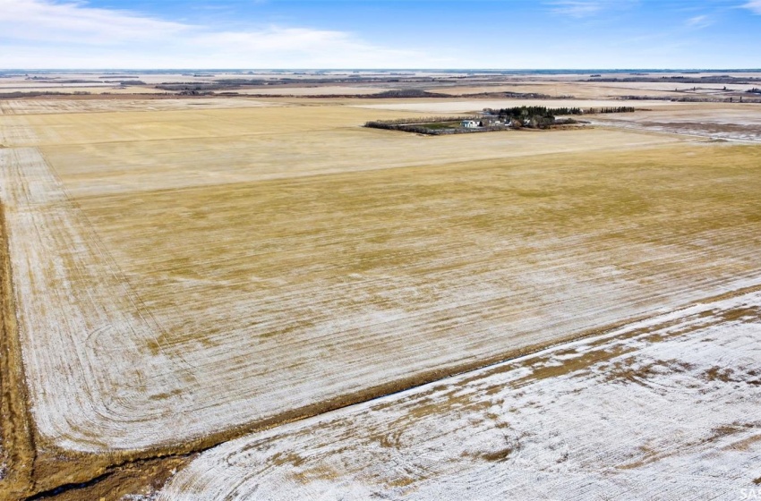 Snowy aerial view with a rural view