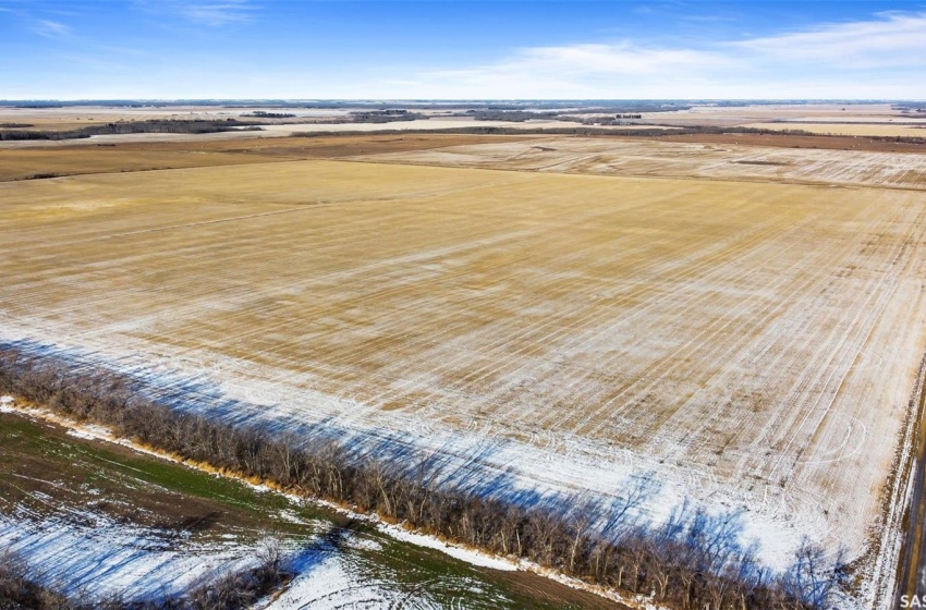 Snowy aerial view featuring a rural view