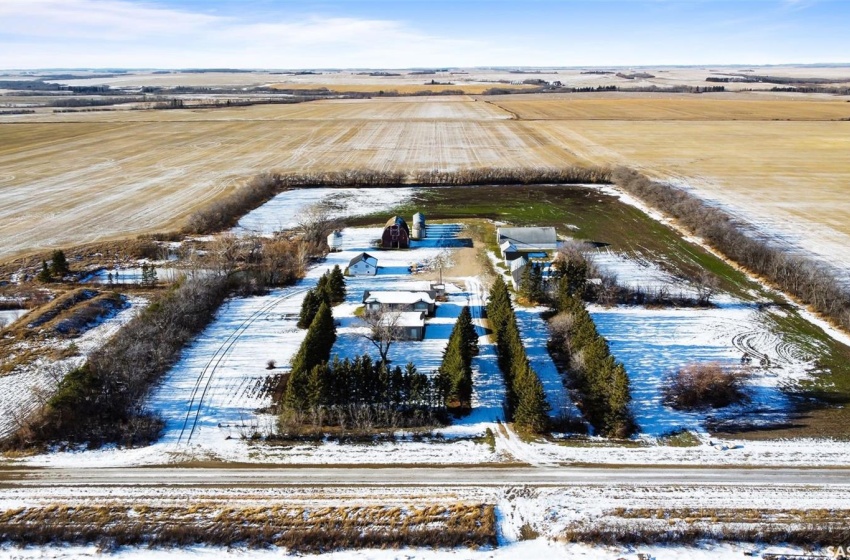 Snowy aerial view with a rural view