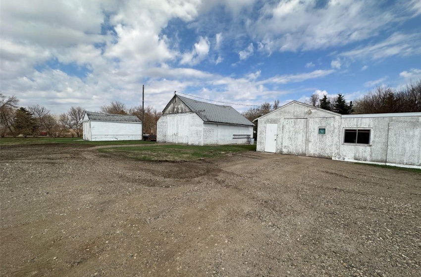 View of yard with a garage