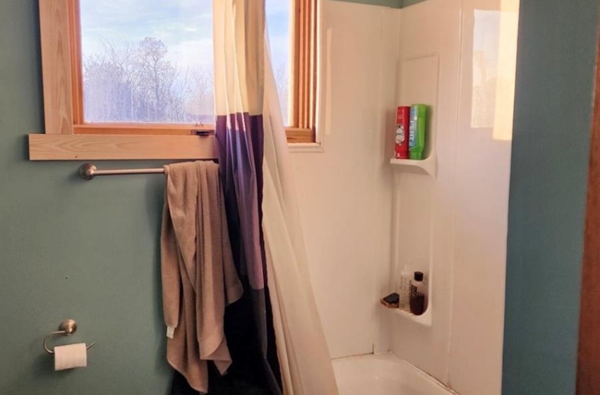 Bathroom with toilet and shower / tub combo