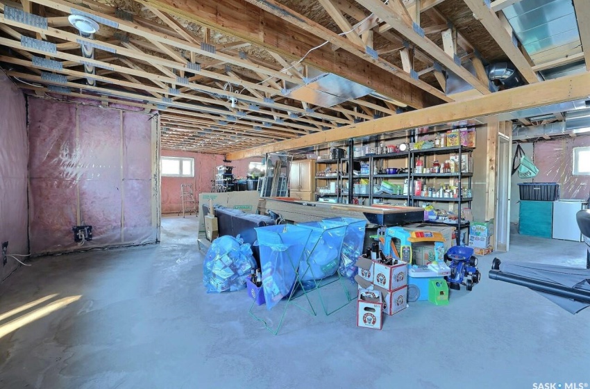 Basement featuring plenty of natural light