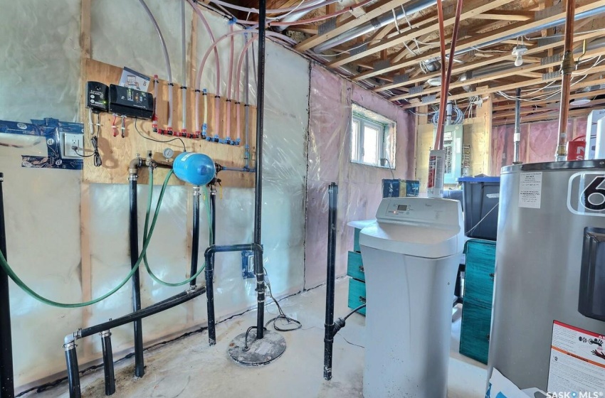 Basement featuring water heater