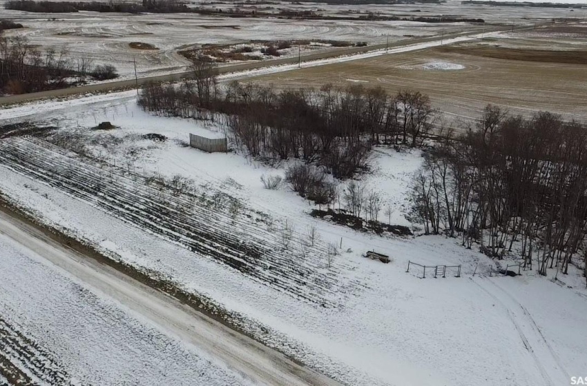 Snowy aerial view with a rural view