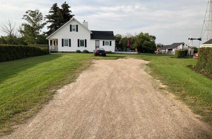 View of front of property featuring a front lawn