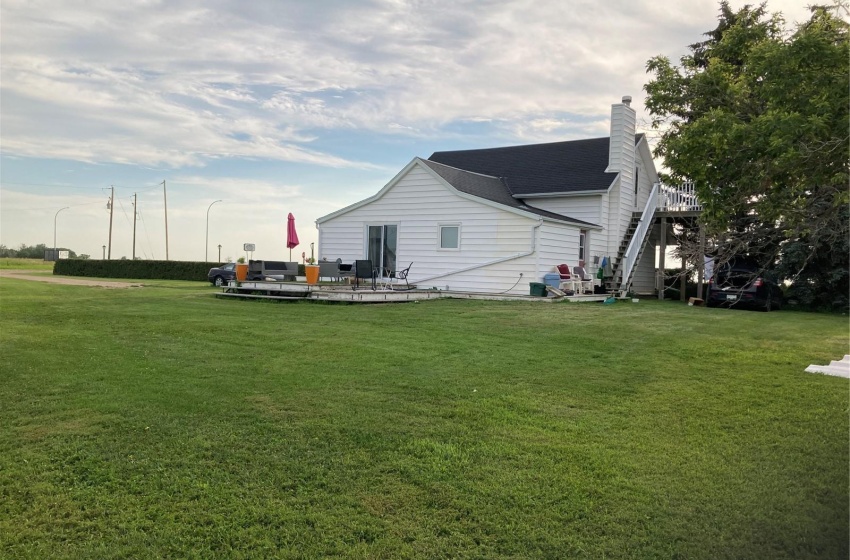 View of yard featuring a wooden deck