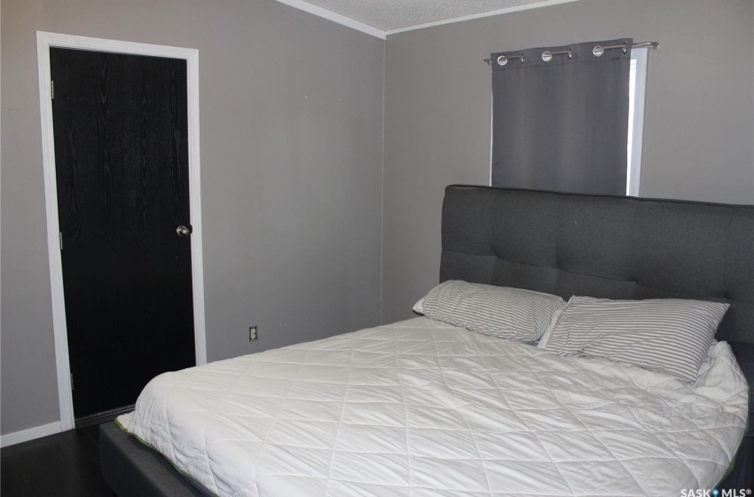 Bedroom featuring crown molding