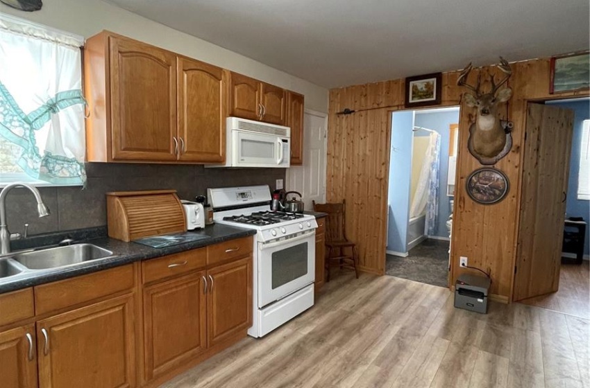 Kitchen with white appliances