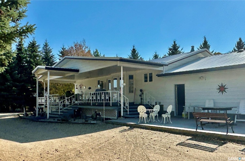 Back of property with a patio