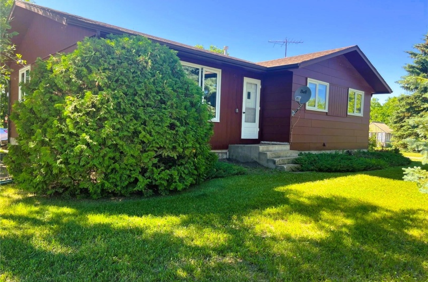 View of front of property with a front lawn