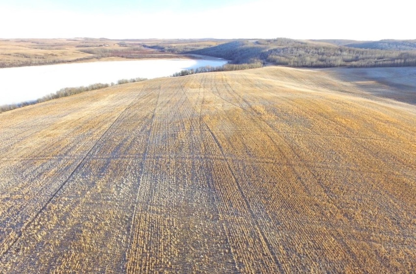 Aerial view with a water view and a rural view