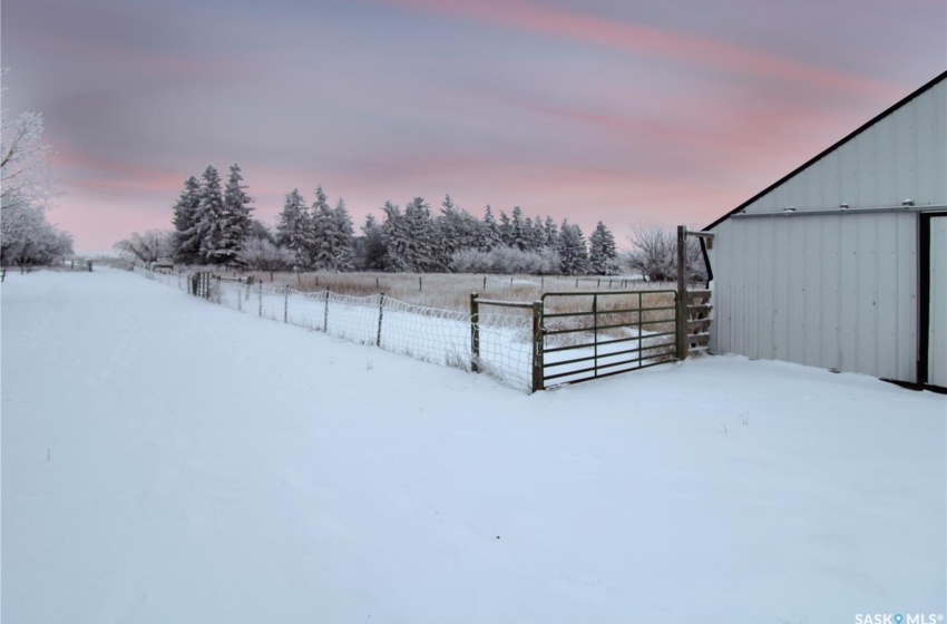 View of yard layered in snow