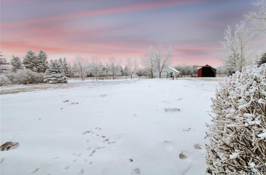 View of yard covered in snow