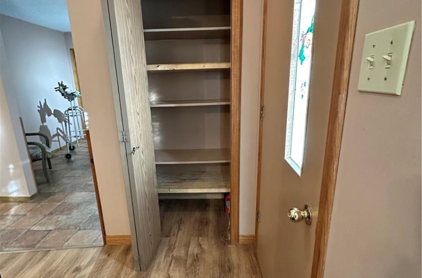 Closet converted to huge pantry with strong shelves