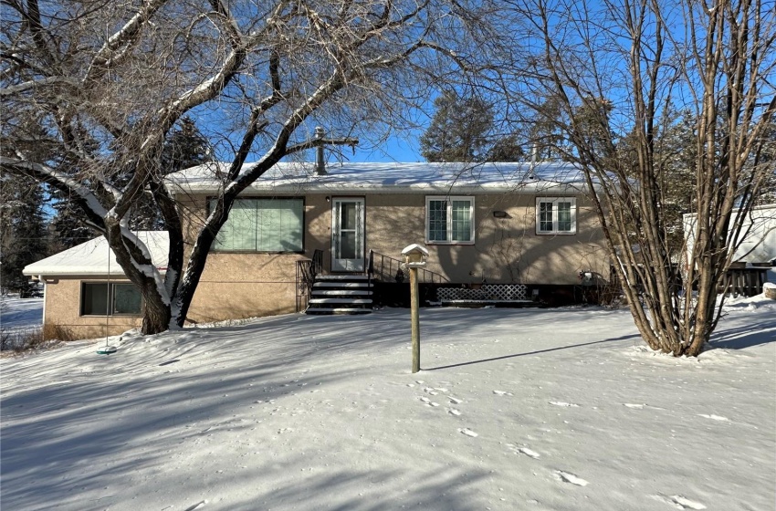 View of ranch-style home with huge front yard