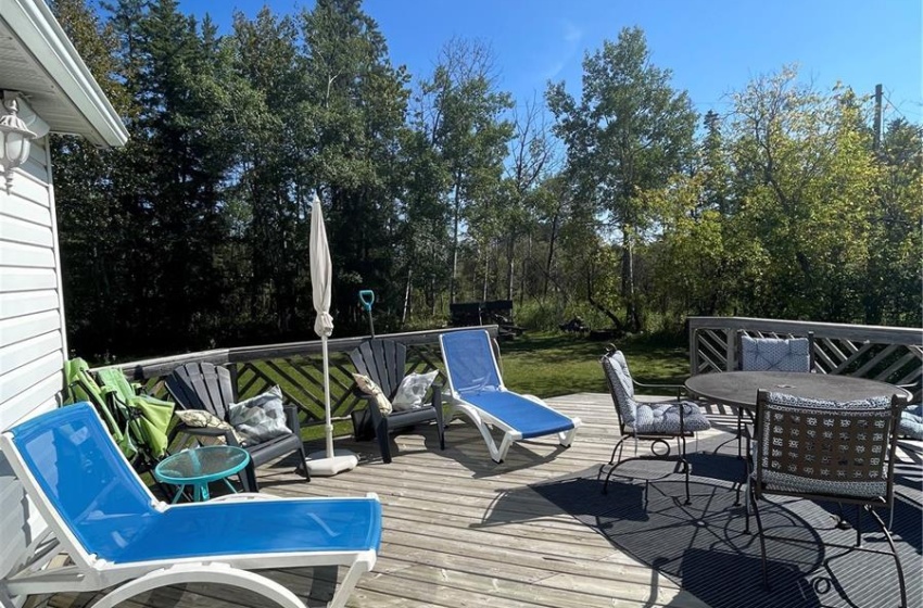 Front large deck faces South off dining room