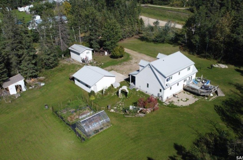 Green house, fenced garden,shop,shed,guest house currently a gym with sauna, a log playhouse