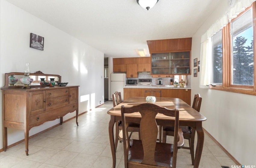 Dining room with light tile floors