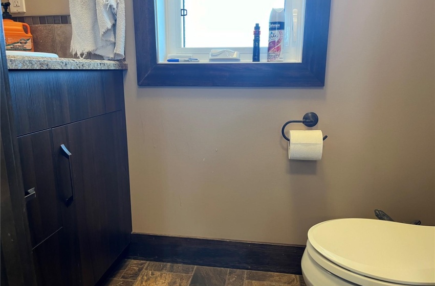 Bathroom with vanity, and toilet