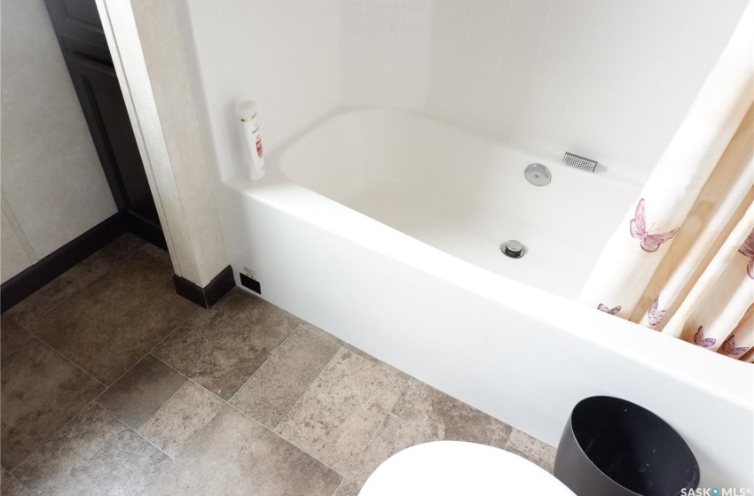 Bathroom with tile flooring