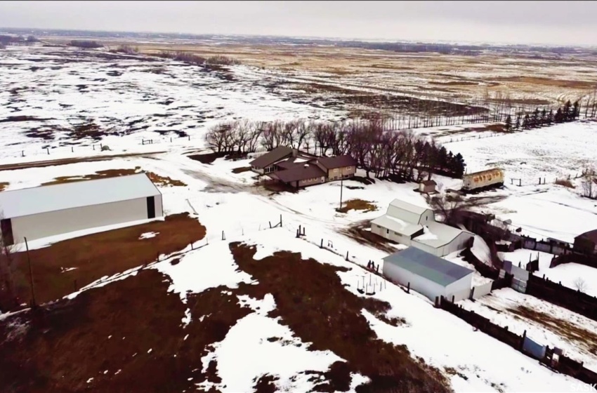 Snowy aerial view featuring a rural view