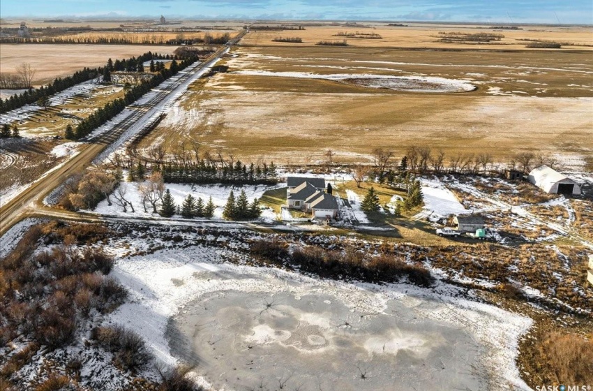 Snowy aerial view featuring a rural view