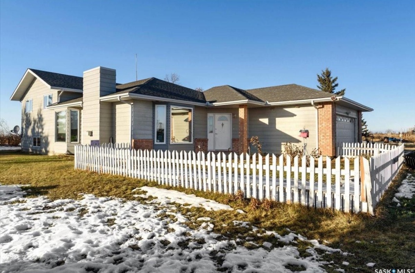 View of front facade featuring a garage