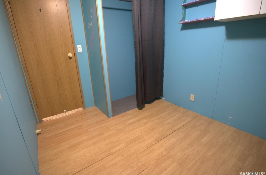 Unfurnished bedroom with light hardwood / wood-style flooring