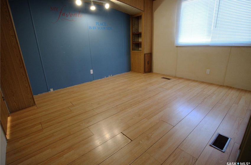 Empty room with light wood-type flooring