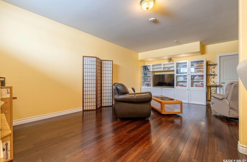 Living room featuring dark wood-type flooring