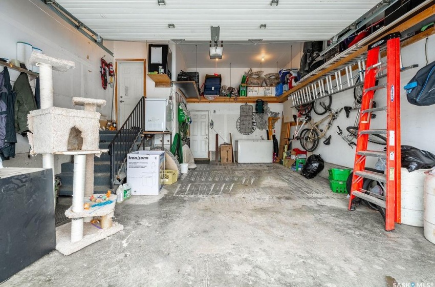 Garage featuring a garage door opener