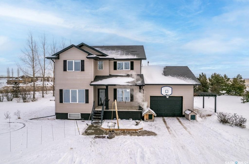 View of property with a garage