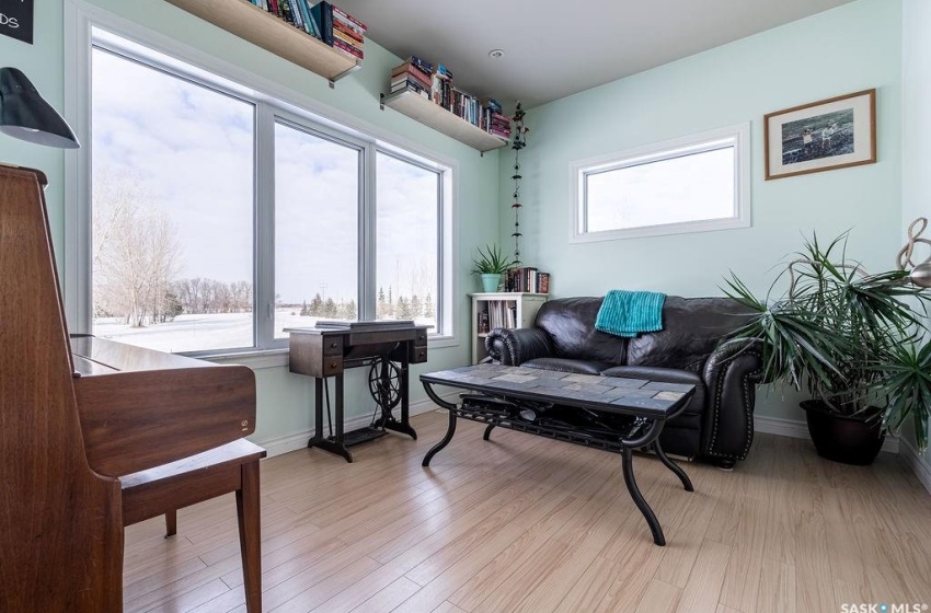 Living area with light wood-type flooring