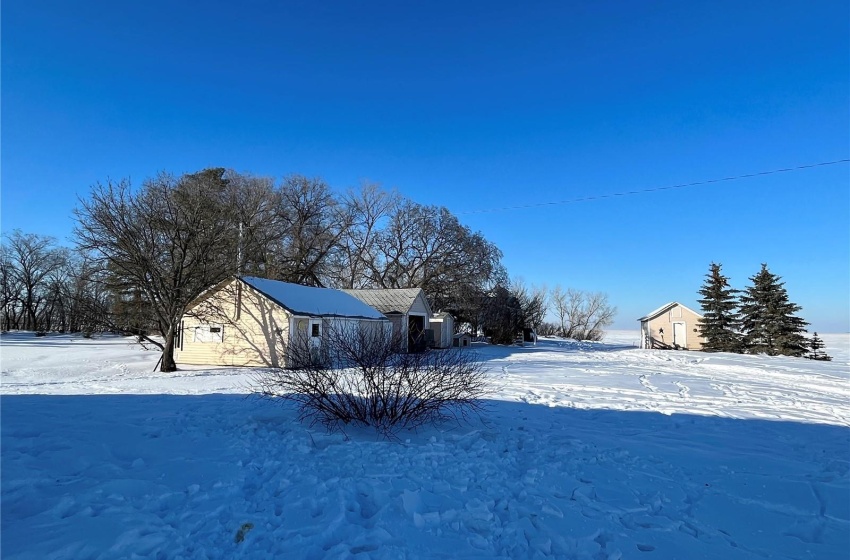 View of yard and outbuildings