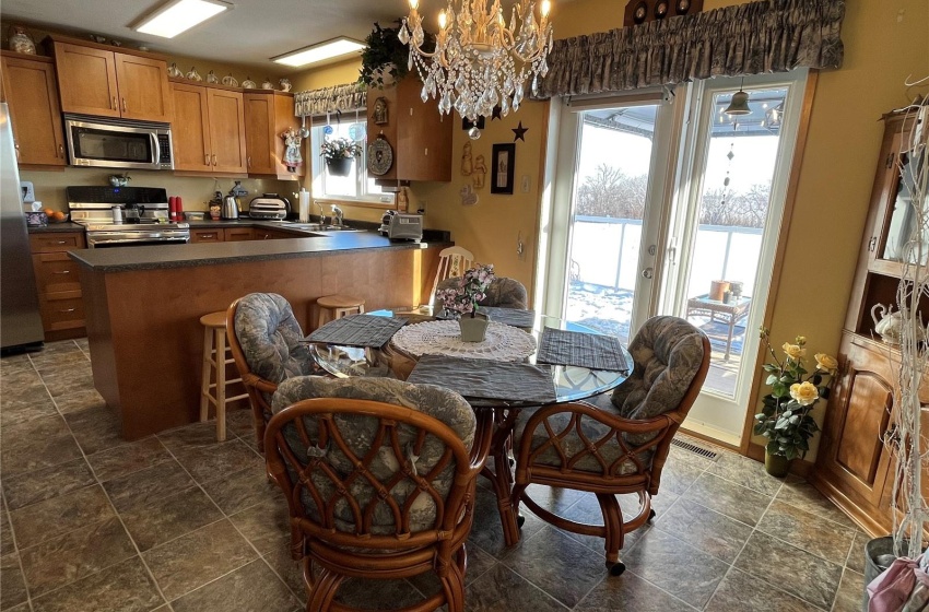 View of dining room into kitchen